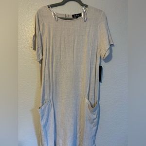 Large lulus oversized linen and rayon mini dress in light tan with pockets.